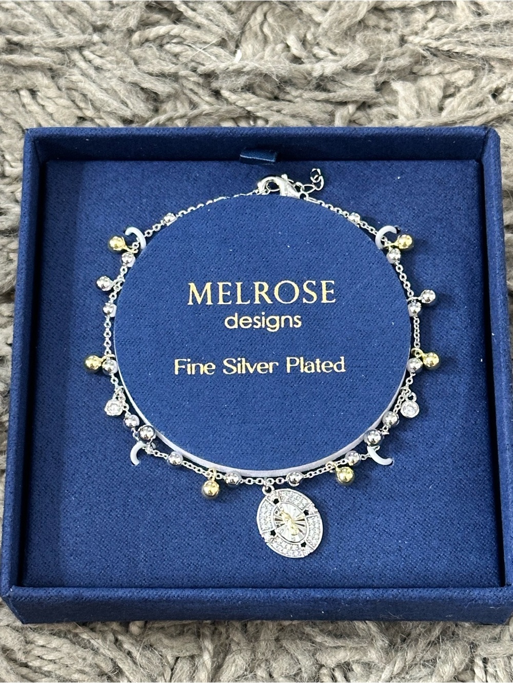 Silver-Plated Multi-Charm Bracelet with Gold Accents